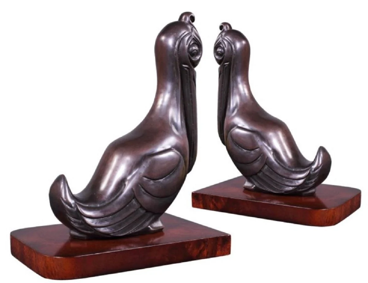 Casa Padrino conjunto de sujetalibros de lujo pelícanos bronce / marrón 18 x 12 x H. 22 cm - Figuras de Bronce Decorado con Base de Madera