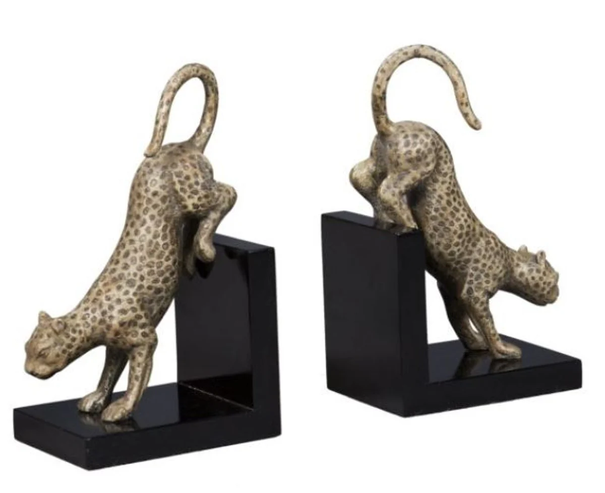 Sujetalibros de lujo Casa Padrino con leopardo de bronce sobre base de madera negra - figuras decorativas de bronce en la base