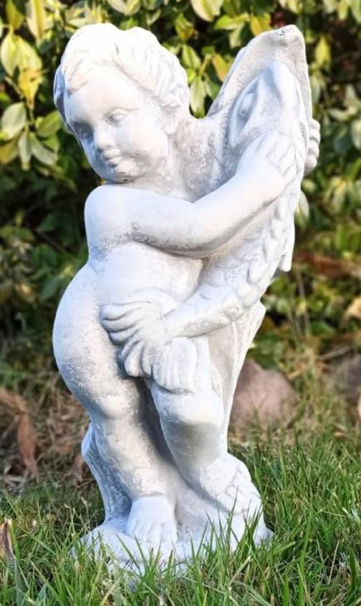 Casa Padrino escultura de gárgola Art Nouveau niño con pez gris A. 48 cm - Elegante figura de piedra de gárgola - Accesorios de Decoración de Jardín Barroco y Art Nouveau