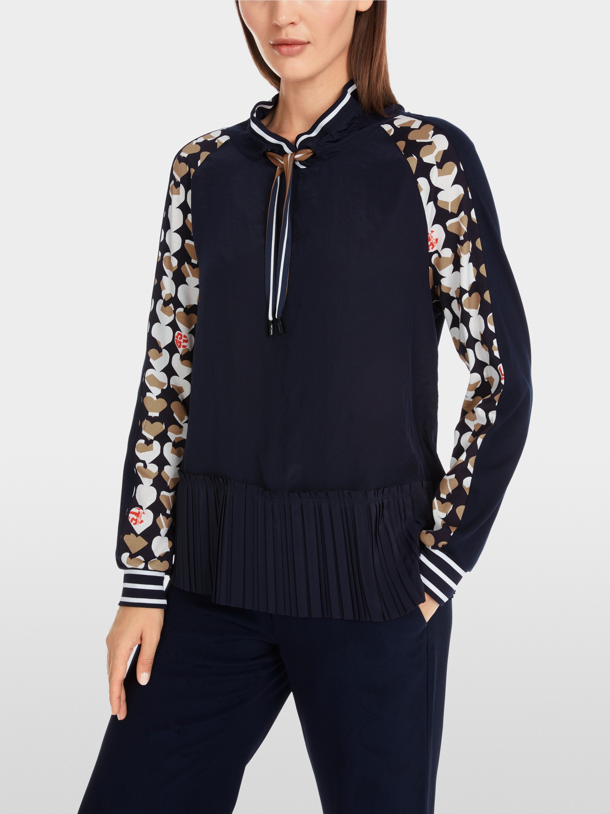 Marc-Cain Loose blouse with pleated peplum