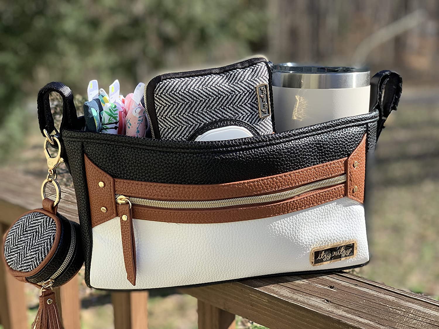 Itzy Ritzy Adjustable Stroller Caddy / Organizer - Stroller Organizer Bag Featuring Front Zippered Pocket, 2 Built-In Interior Pockets & Adjustable Straps to Fit Nearly Any Stroller (Coffee and Cream) Coffee & Cream