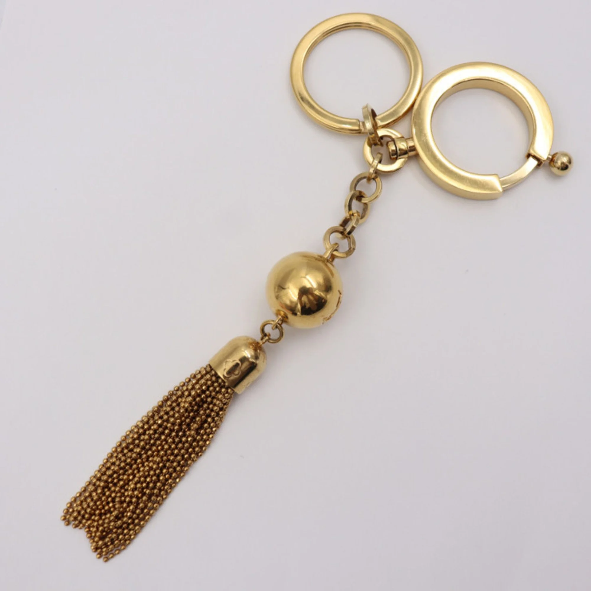 Pre-Owned LOUIS VUITTON Louis Vuitton Portocre Swing Keychain M65997 Metal Gold Keyring Bag Charm (Good)