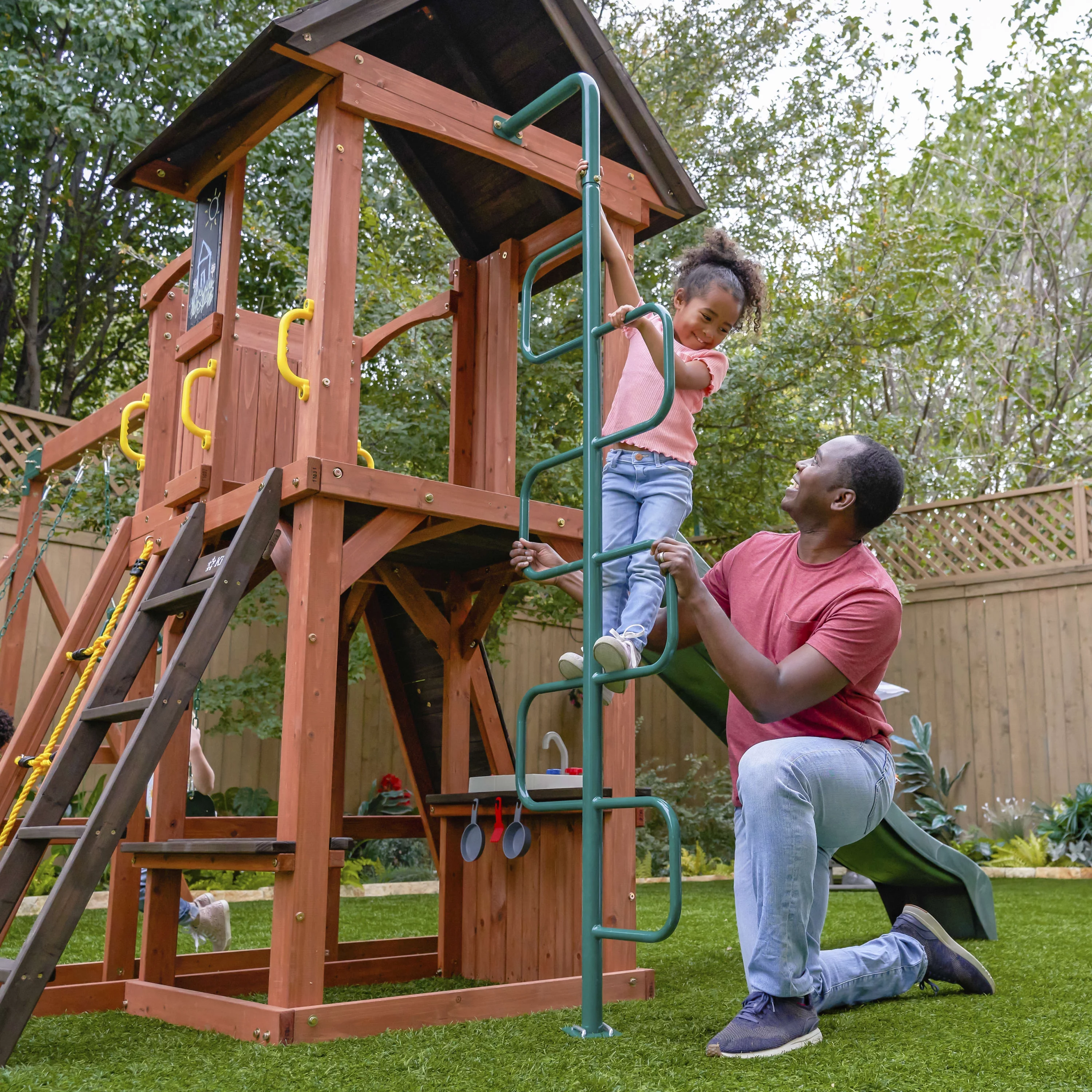 KidKraft Raptor Trail Wooden Outdoor Swing Set with Wavy Slide and Rock Wall, For Ages 3-10