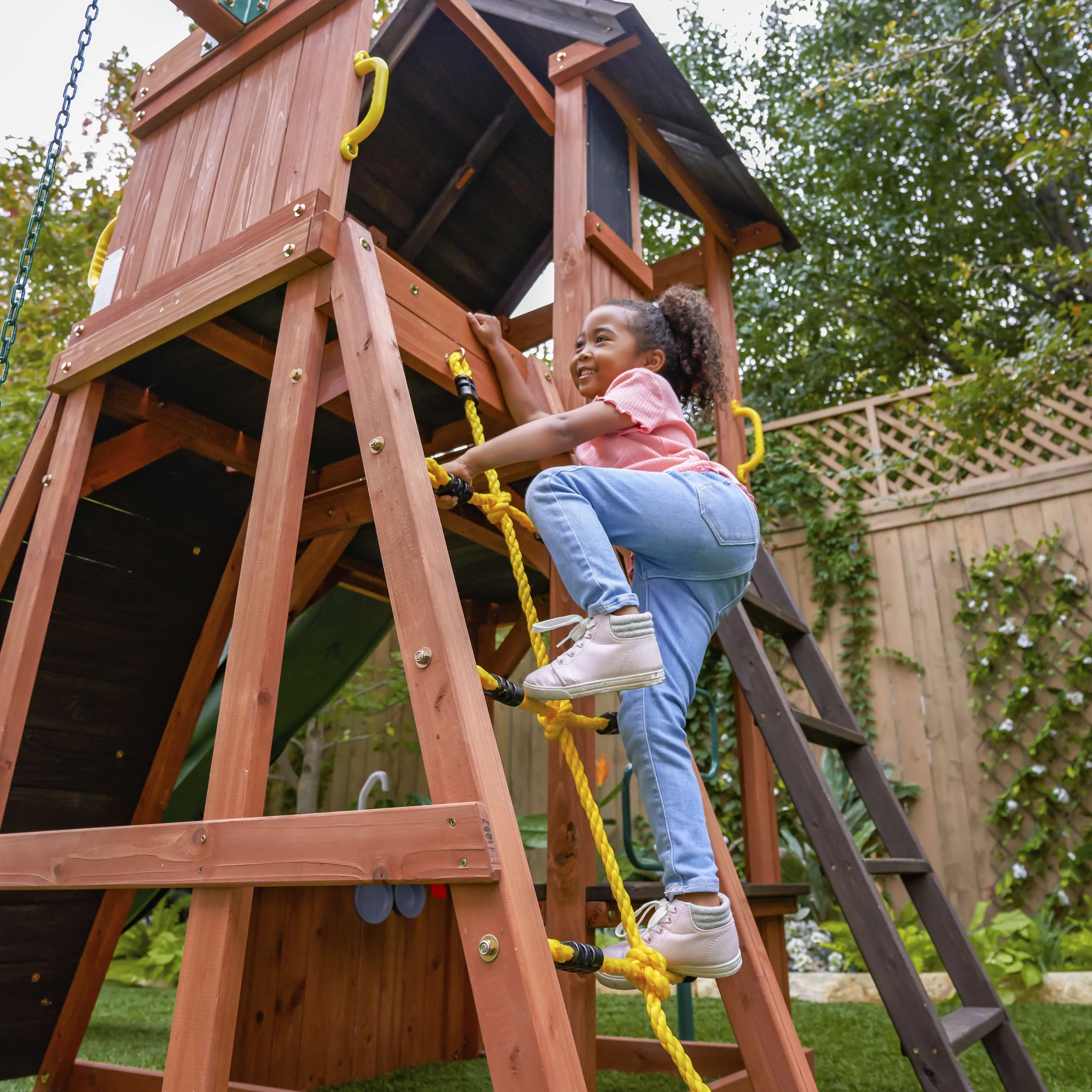 KidKraft Raptor Trail Wooden Outdoor Swing Set with Wavy Slide and Rock Wall, For Ages 3-10