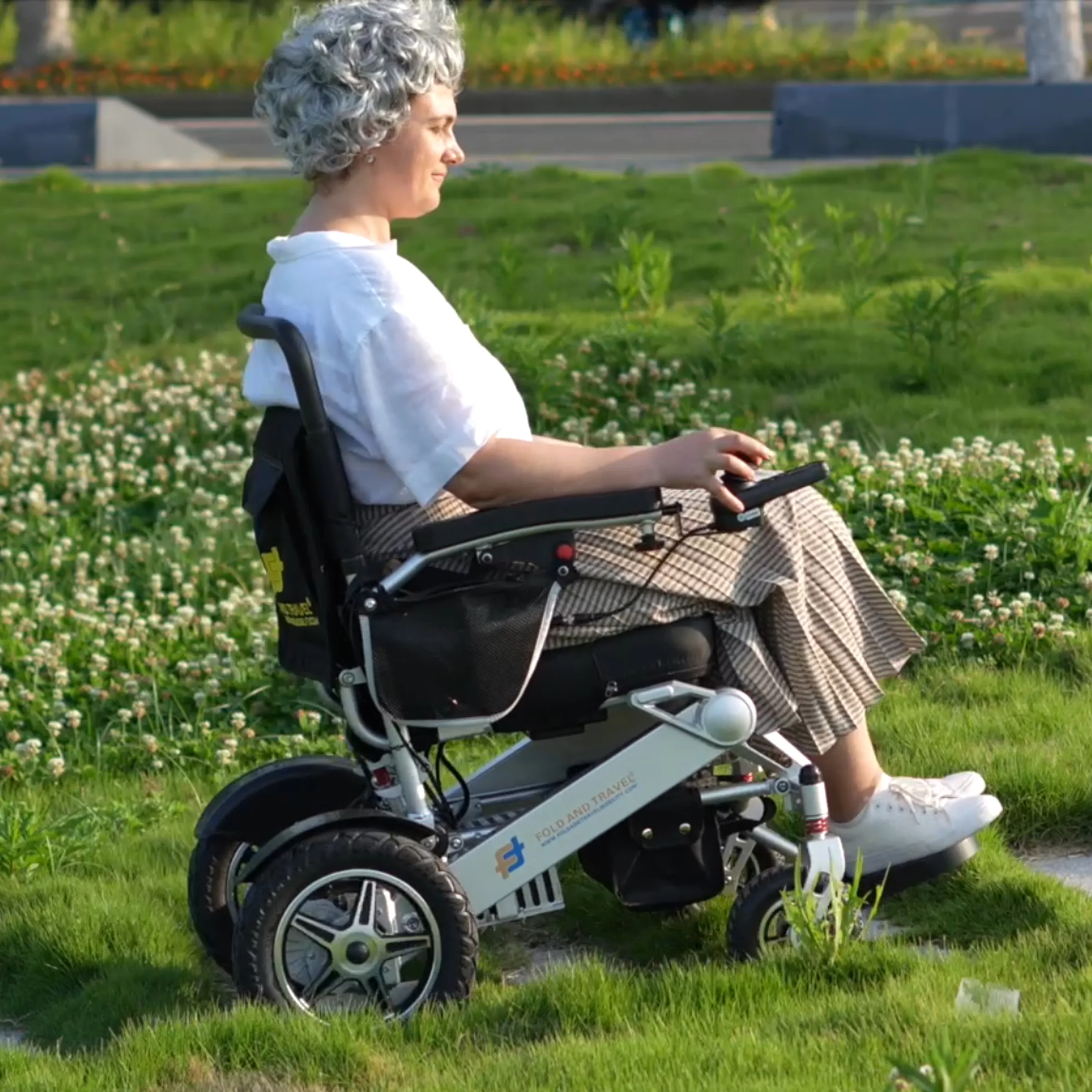 Fold And Travel Lightweight Foldable Remote Control Portable Electric Power Wheelchair - Silver Frame, Black Seat