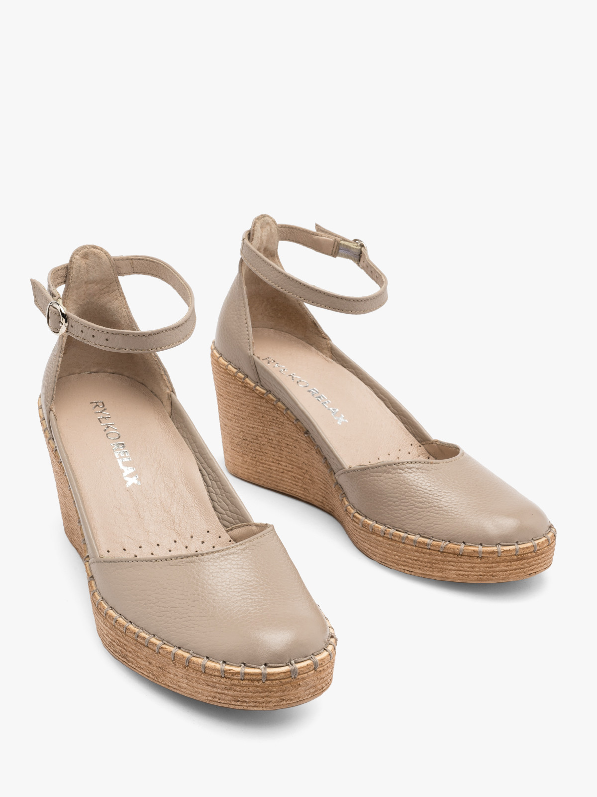 Beowe czóenka z paskiem wokó kostki