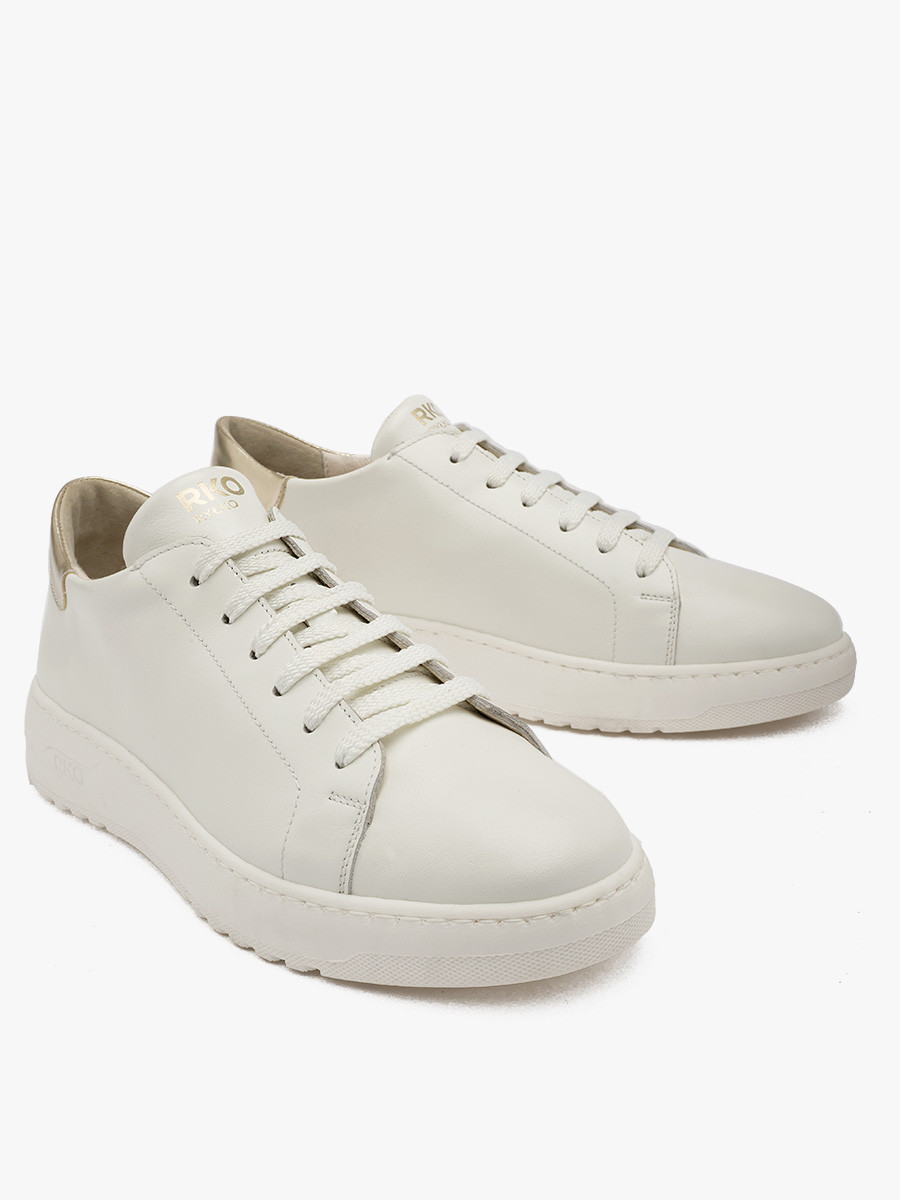 Kremowe póbuty sportowe ze zot wstawk