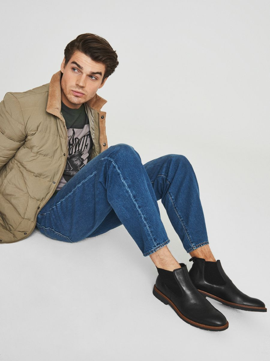 Czarne sztyblety mskie z ozdobn podeszw