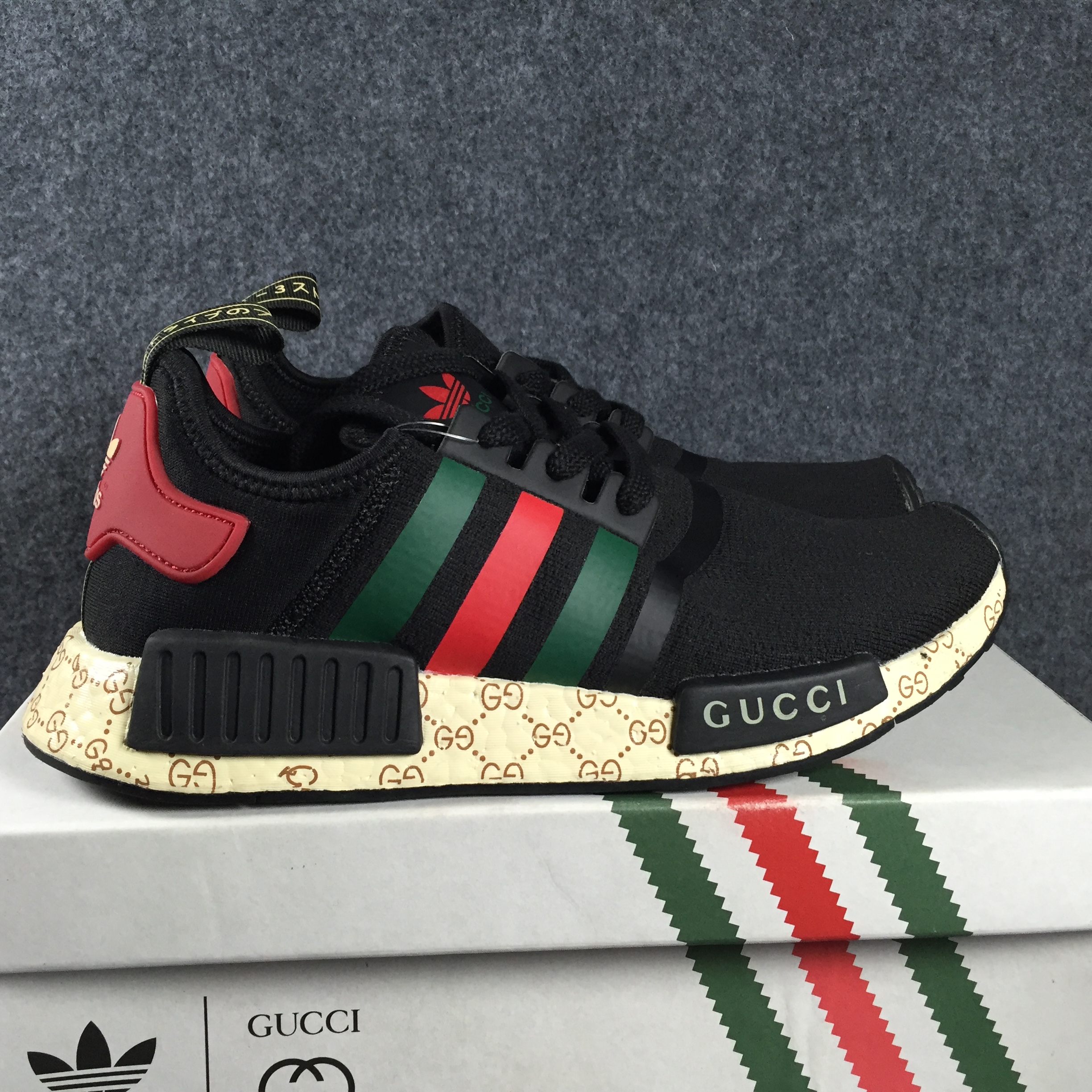 g*u*i x Ad*s nmd boost  s70166