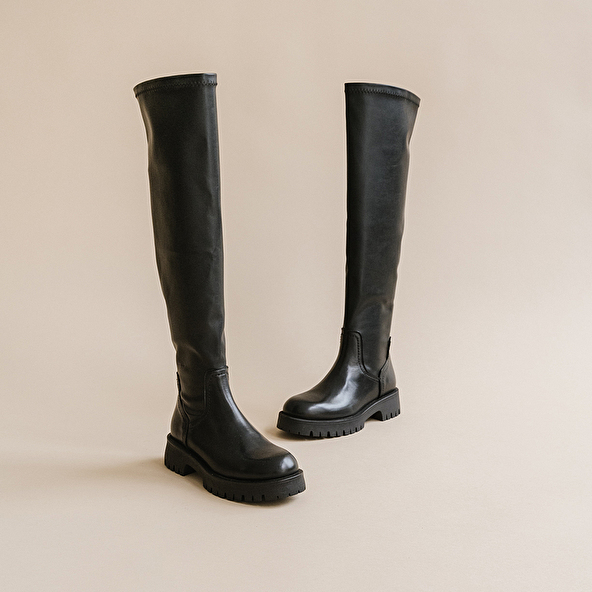 BOOTS WITH NOTCHED SOLES