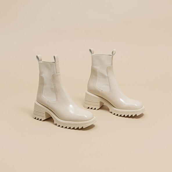 BOOTS WITH ELASTICS AND NOTCHED SOLE