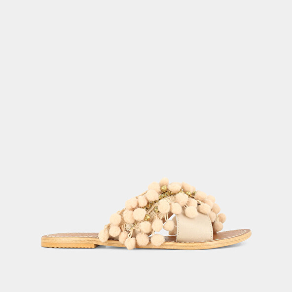 MULES IN BEIGE LEATHER AND TEXTILE