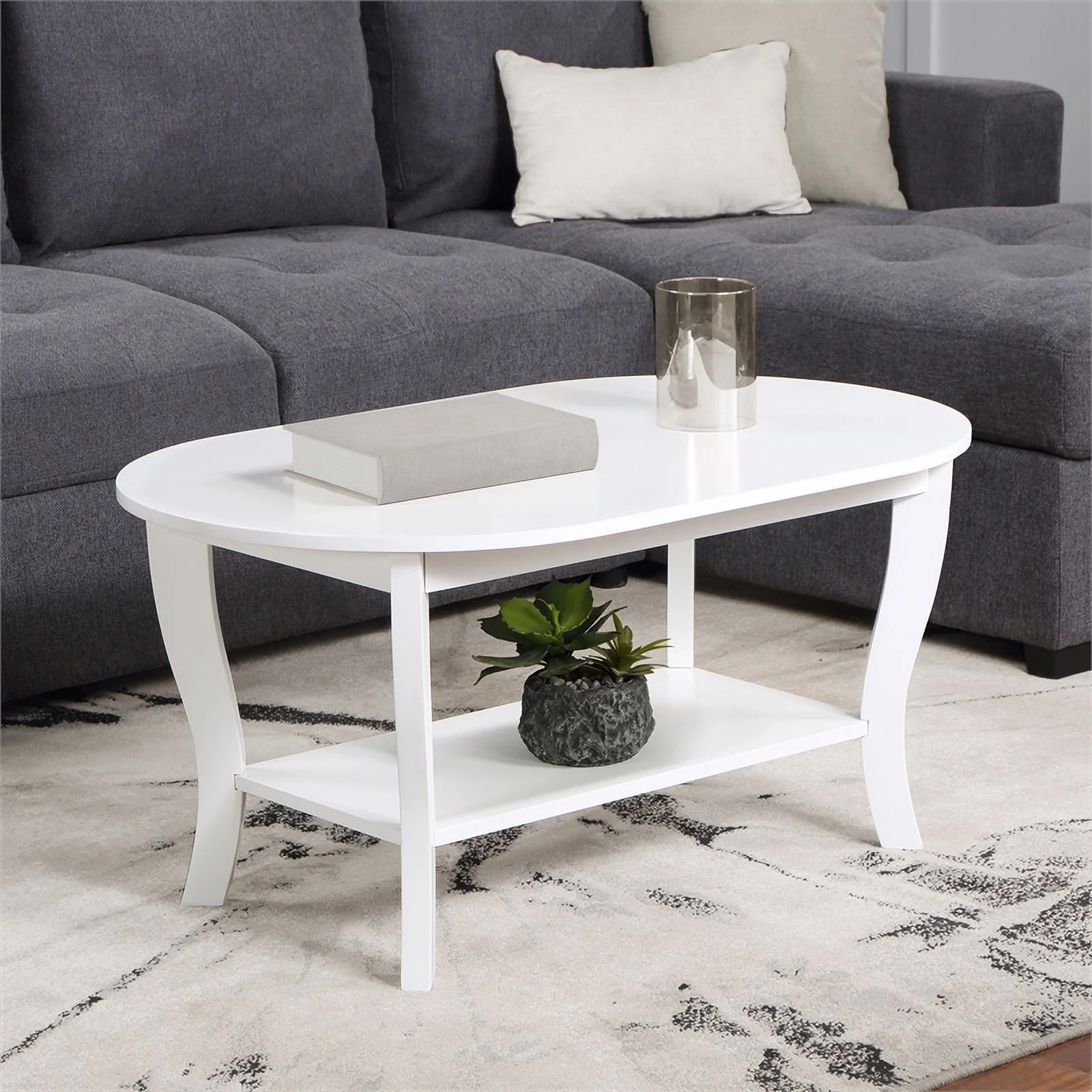 Pemberly Row Oval Coffee Table with Shelf in White Wood Finish