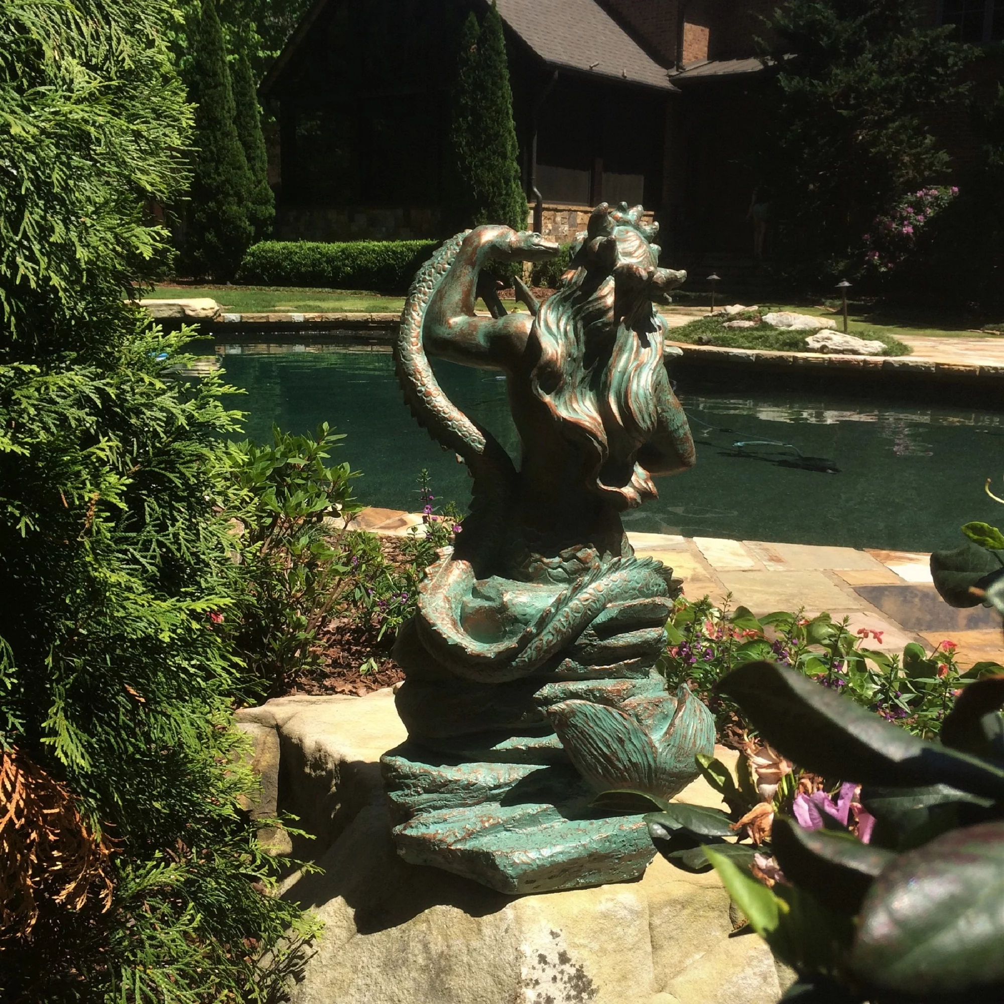 Homestyles 22 in. Bronze Patina Poseidon Ruler of Sea Sitting on Rock Nautical Beach Extra Large Mermaid Statue