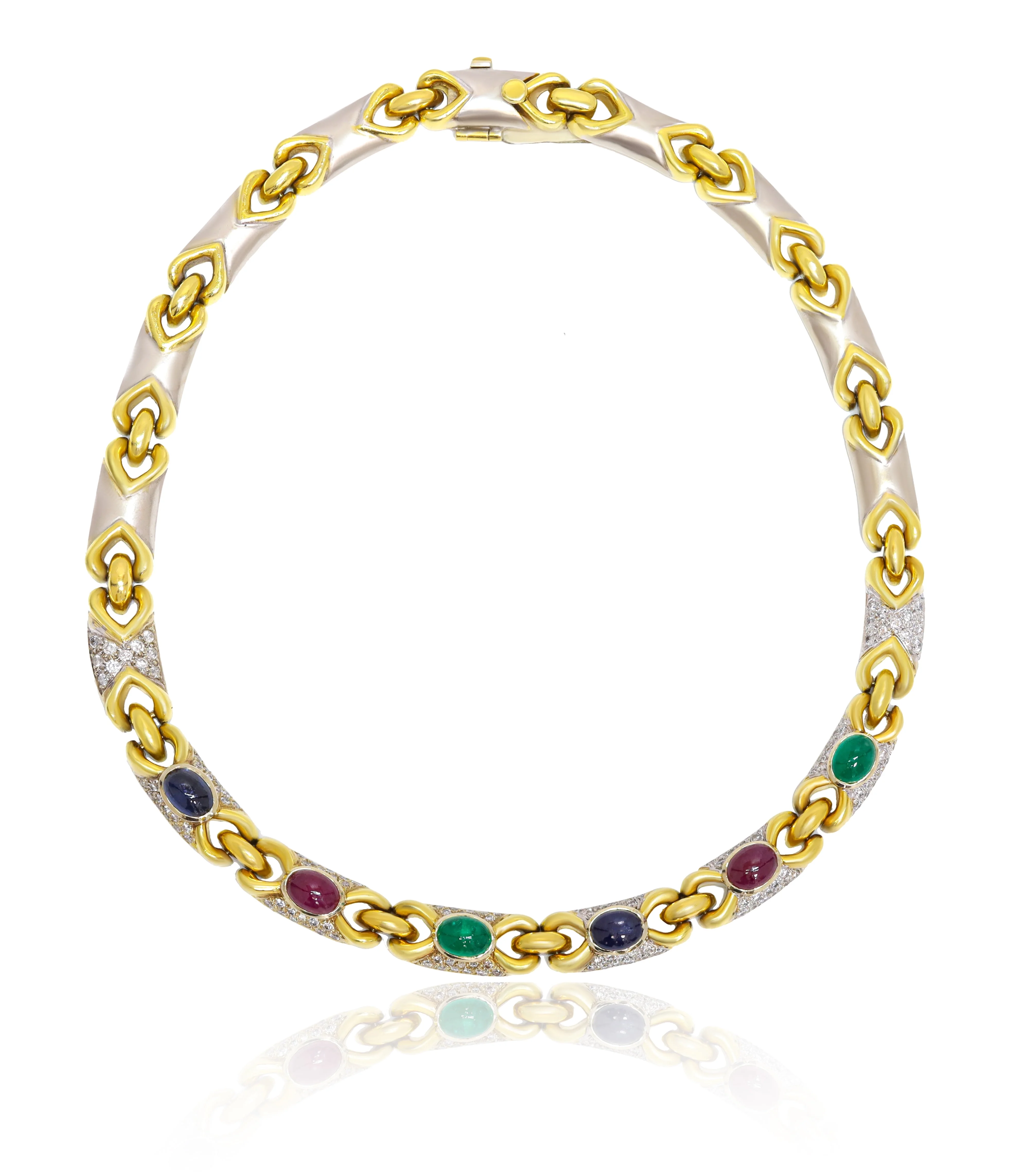18kt two tone multi-stone necklace featuring 11.00 cts of pave round diamonds and 12.00 cts of cabochon emeralds, rubies, and sapphires