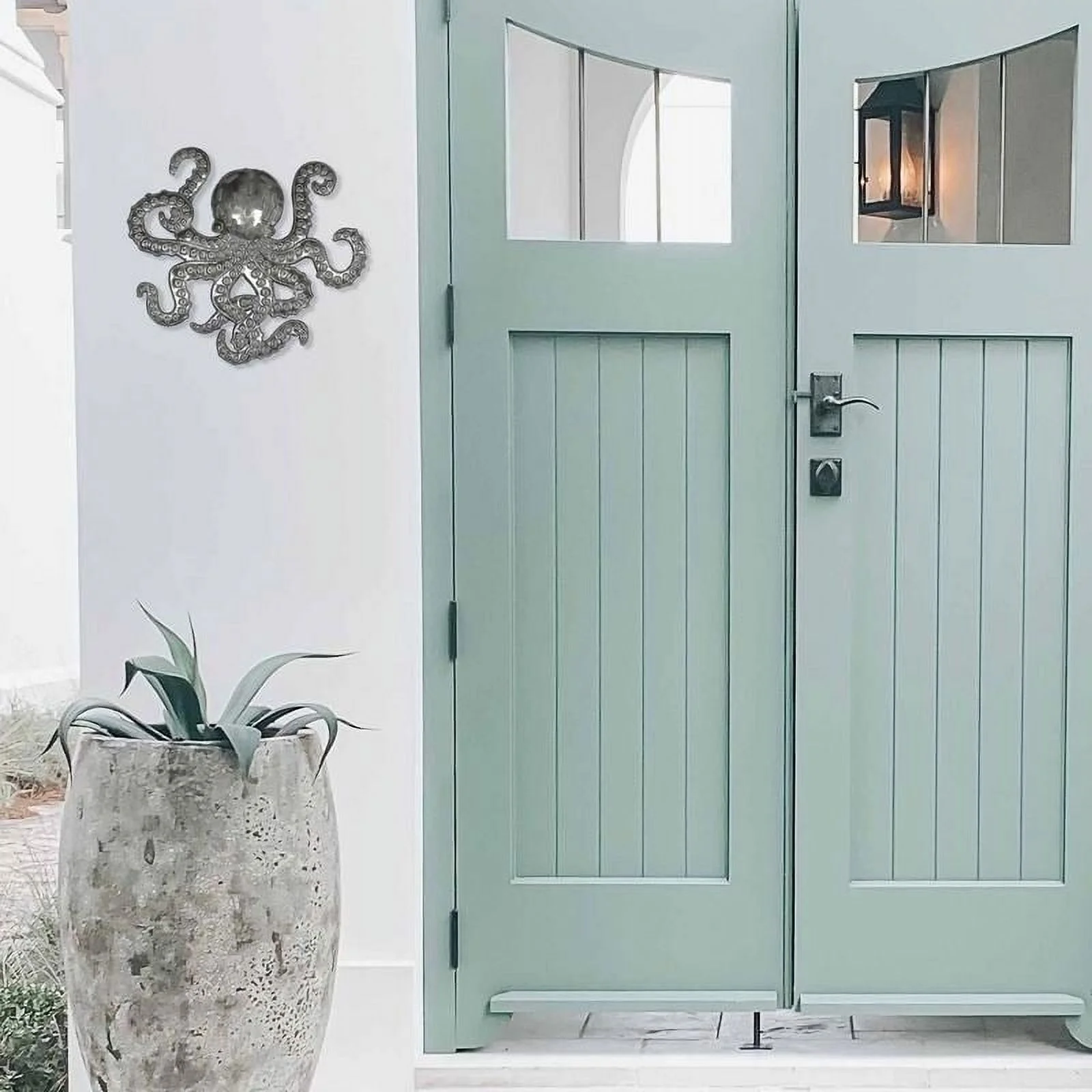 The Curated Nomad  16-inch Embossed Octopus Recycled Metal Haitian Wall Art