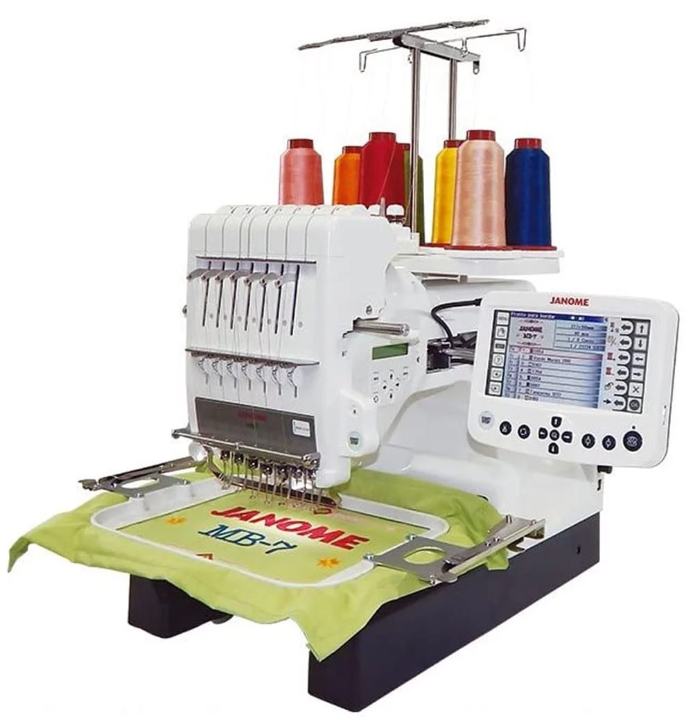Janome MB-7 Seven-Needle Embroidery Machine w/ Double Platinum Embroidery Package!