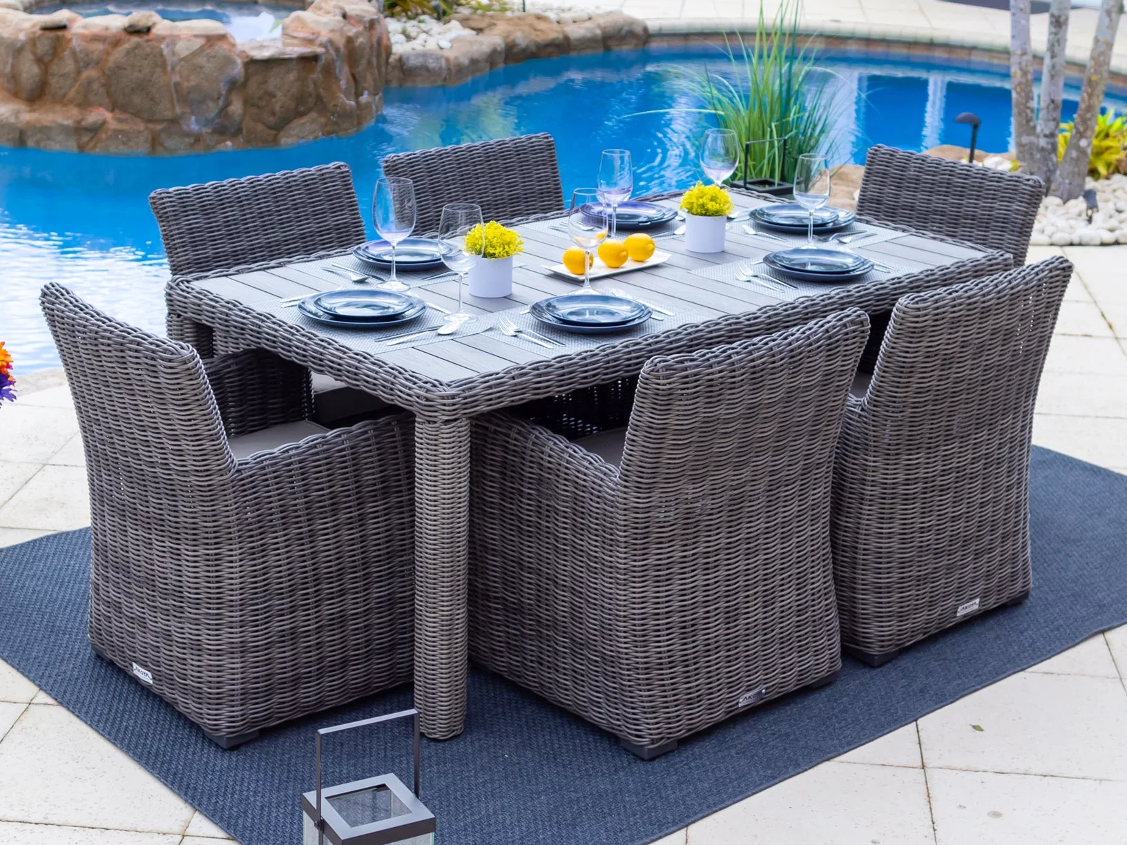 Malmo 7-Piece Resin Wicker Outdoor Patio Furniture Dining Table Set In Gray w/ Dining Table and Six Cushioned Chairs (Full-Round Gray Wicker, Polyester Light Gray)