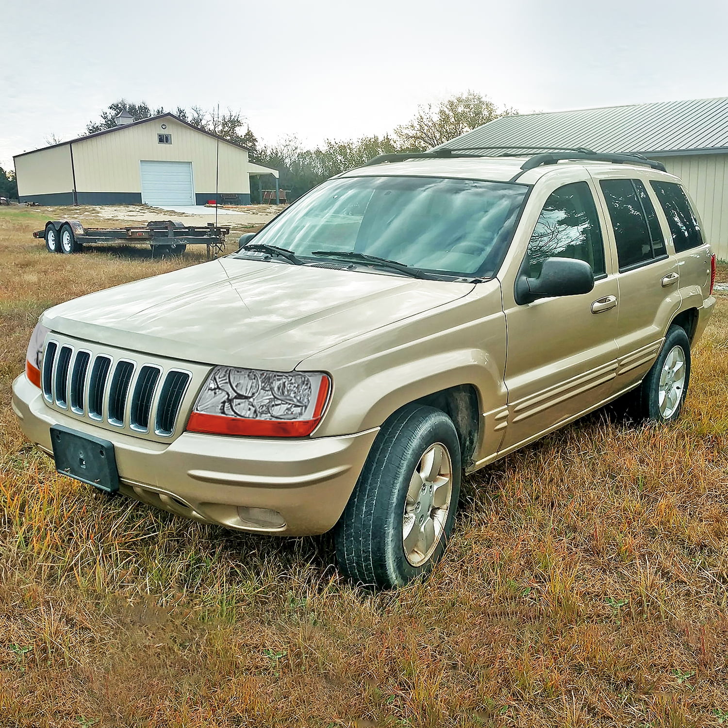 Spec-D Tuning Clear Headlights Compatible with 1999-2004 Jeep Grand Cherokee L+R Pair Head Light Lamp Assembly