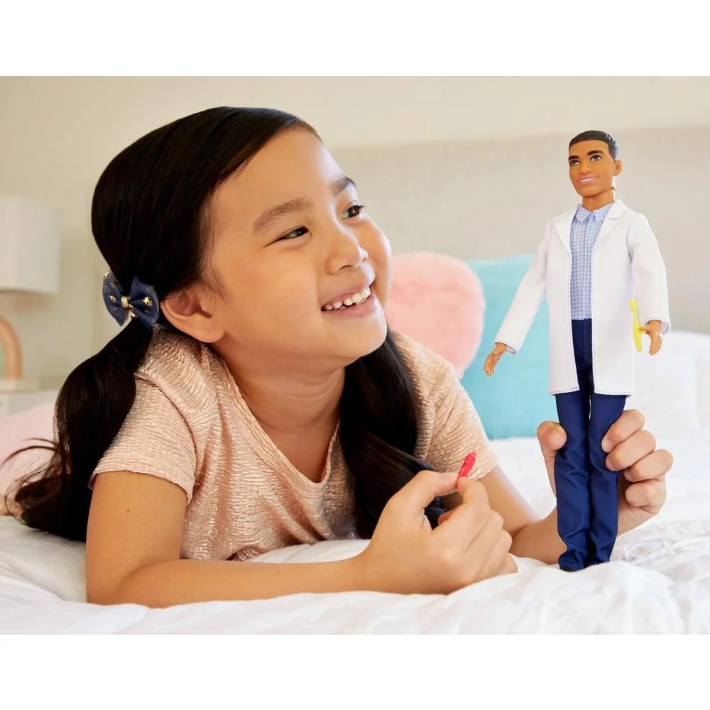 Barbie Career Ken Dentist Doll with Professional Dental Coat Plus 2 Dental Toothbrush and Toothpaste Accessories for Ages 3 Years and Up