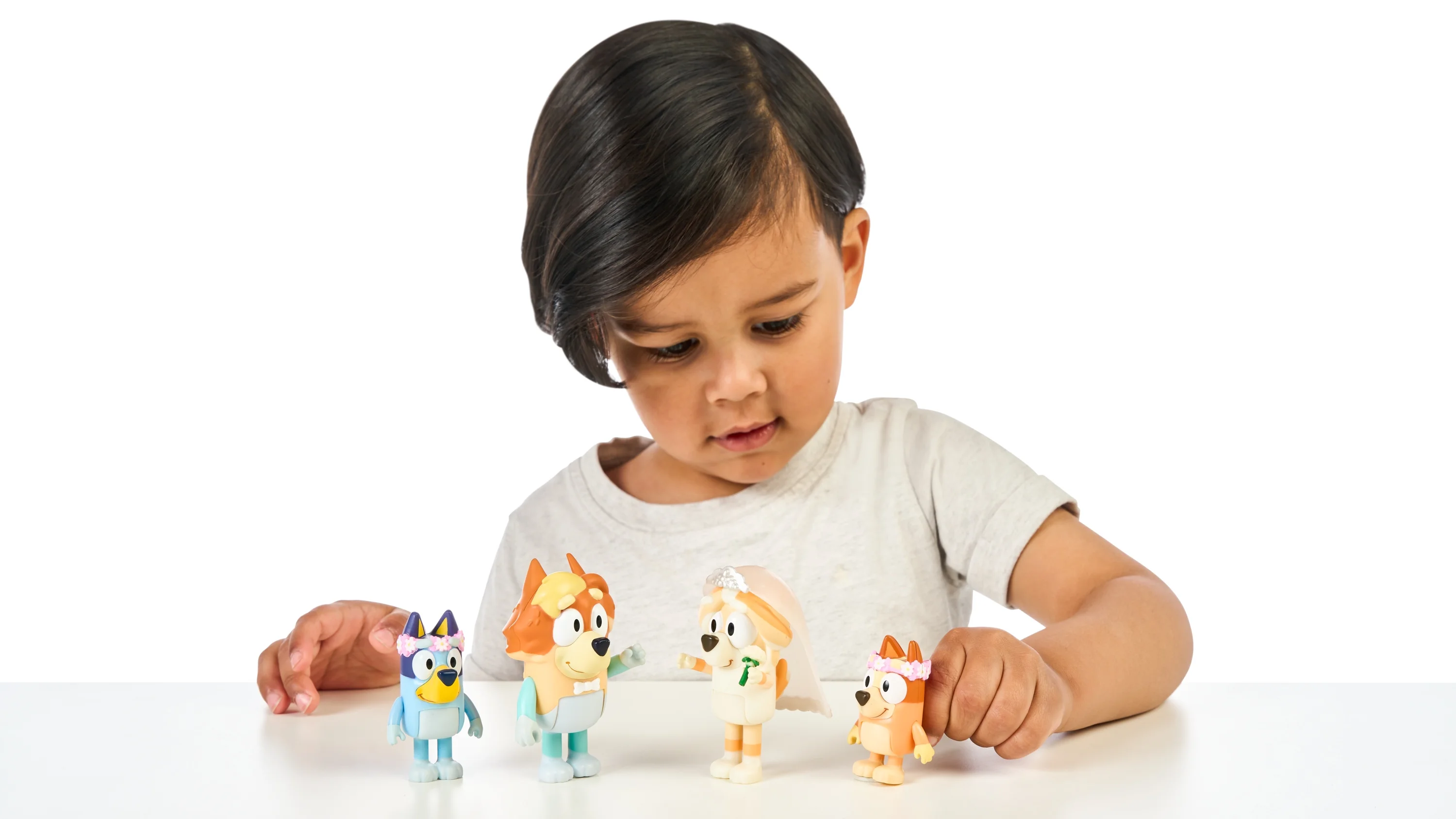 Bluey 4-Pack Wedding Time  Figures, Includes  Uncle Rad, Frisky, Bluey and Bingo, Ages 3+