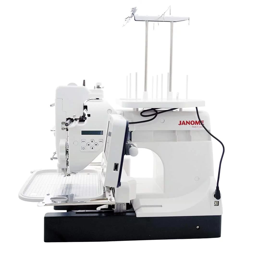 Janome MB-7 Seven-Needle Embroidery Machine w/ Double Platinum Embroidery Package!