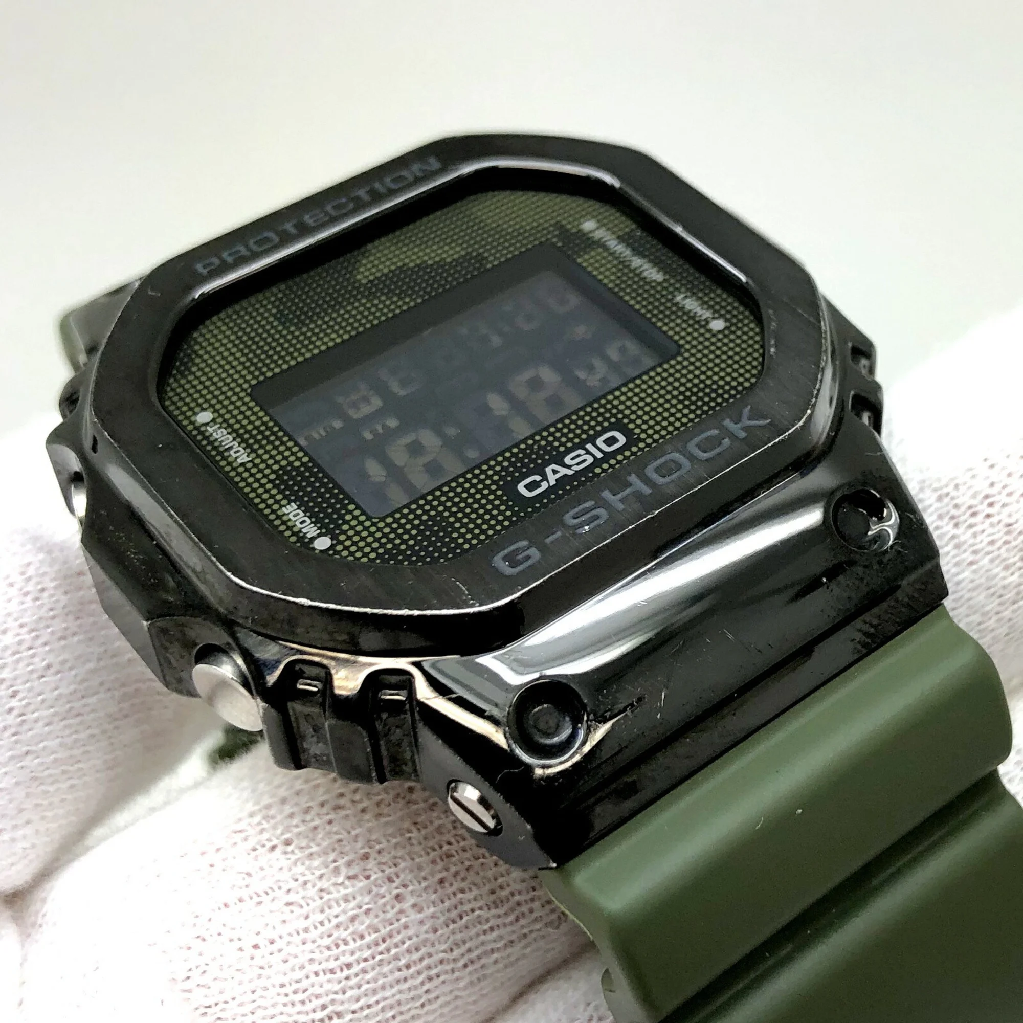 Pre-Owned CASIO Casio G-SHOCK Watch GM-5600B-3 Metal Cover Rubber Square Face Digital Quartz Khaki Green Black Men's ITWHOGO3GV8W (Fair)