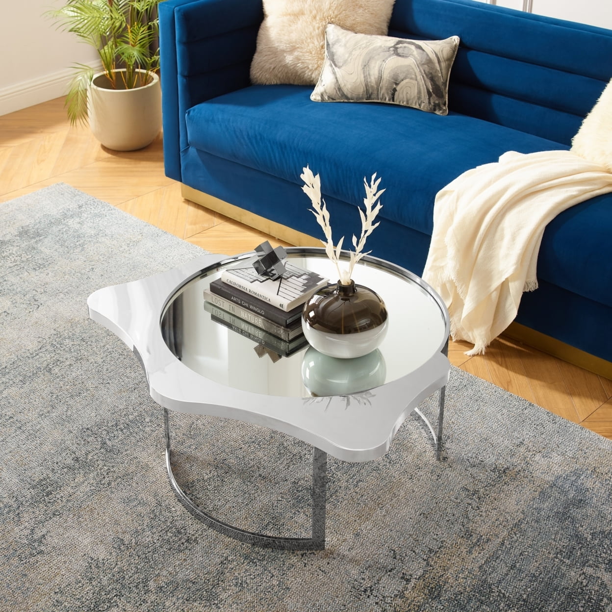 Caris Coffee Table - Mirrored Top Abstract Shape Open Rounded Frame