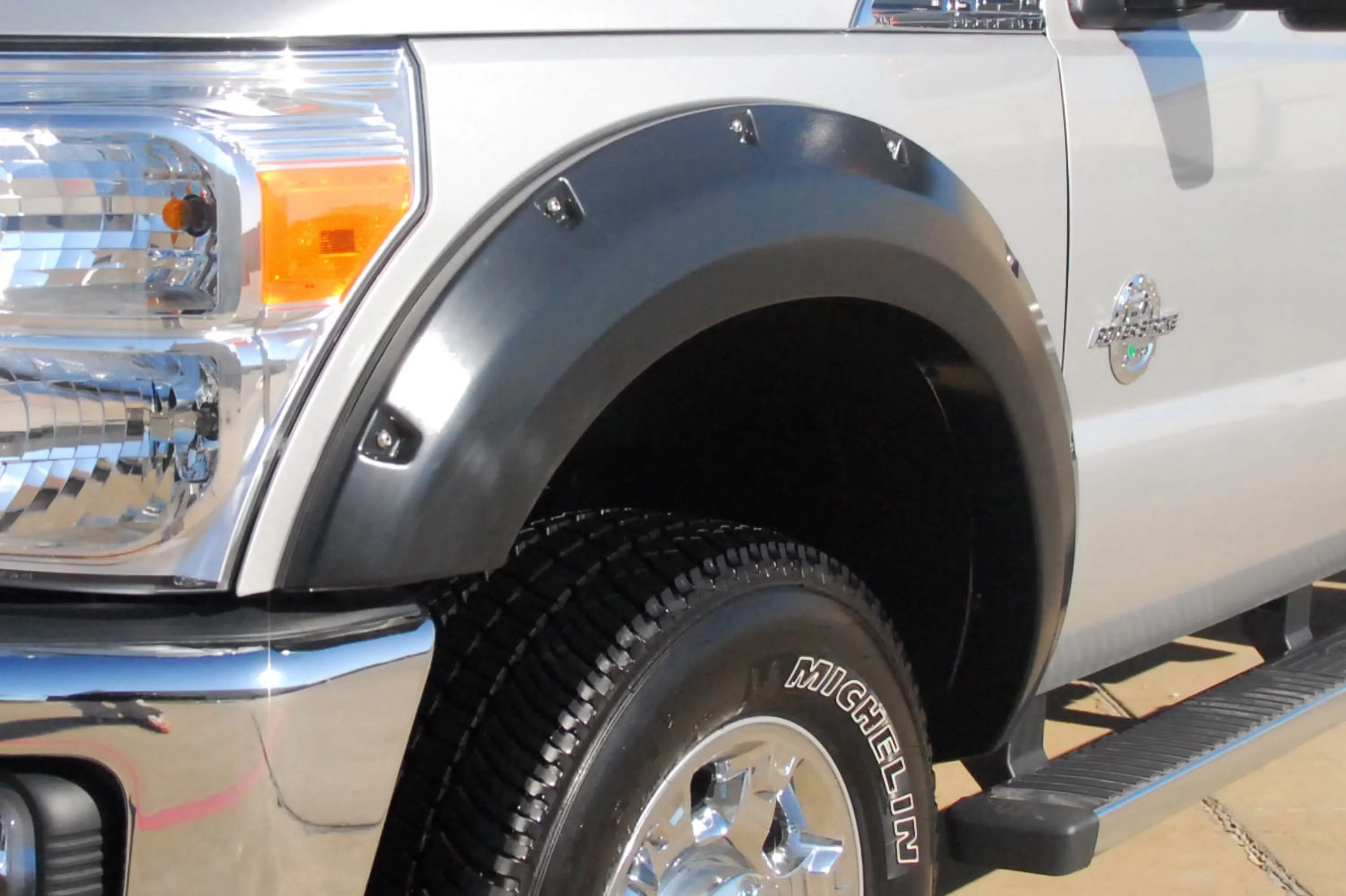 Lund By Realtruck RX314Ta Elite Series Black Rivet Style Textured Front Fender Flare - 2 Piece