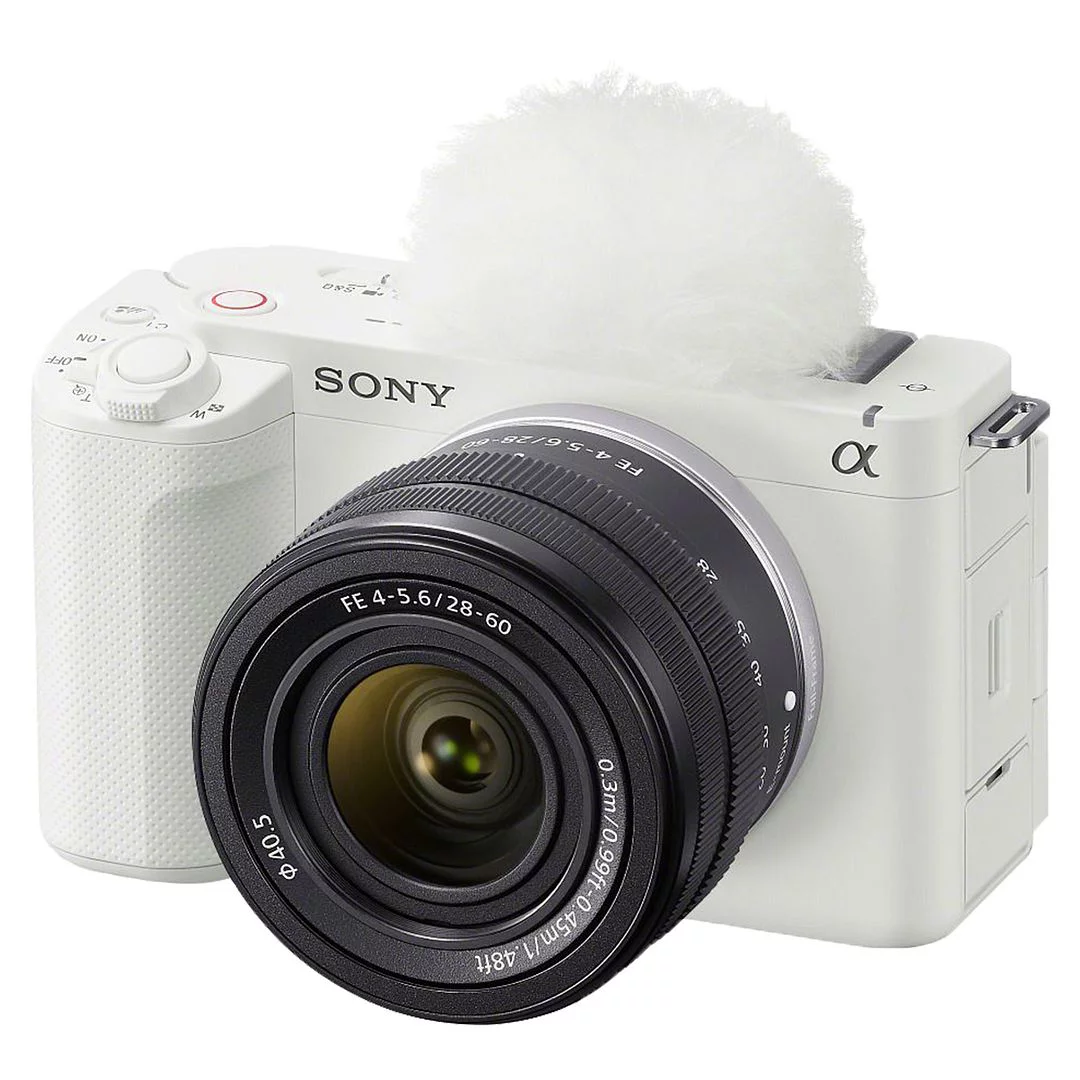 Sony ZV-E1 Mirrorless Camera (White) with FE 28-60mm Lens + SanDisk 64GB Card + Case + UV Filter + ZeeTech Accessory Bundle