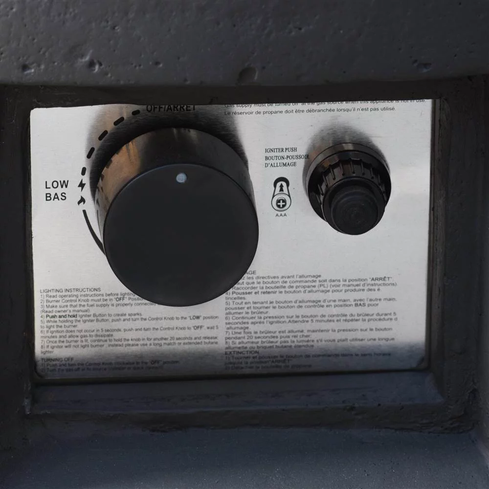 Noble House Aidan 50.000 BTU Round Stone Fire Pit with Tank Holder in Dark Gray