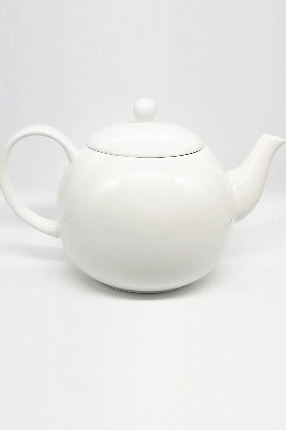 Furmaware 40oz Porcelain Teapot for Brewing Your Favorite Blooming and Loose Leaf Tea. Easy Pouring Teapot