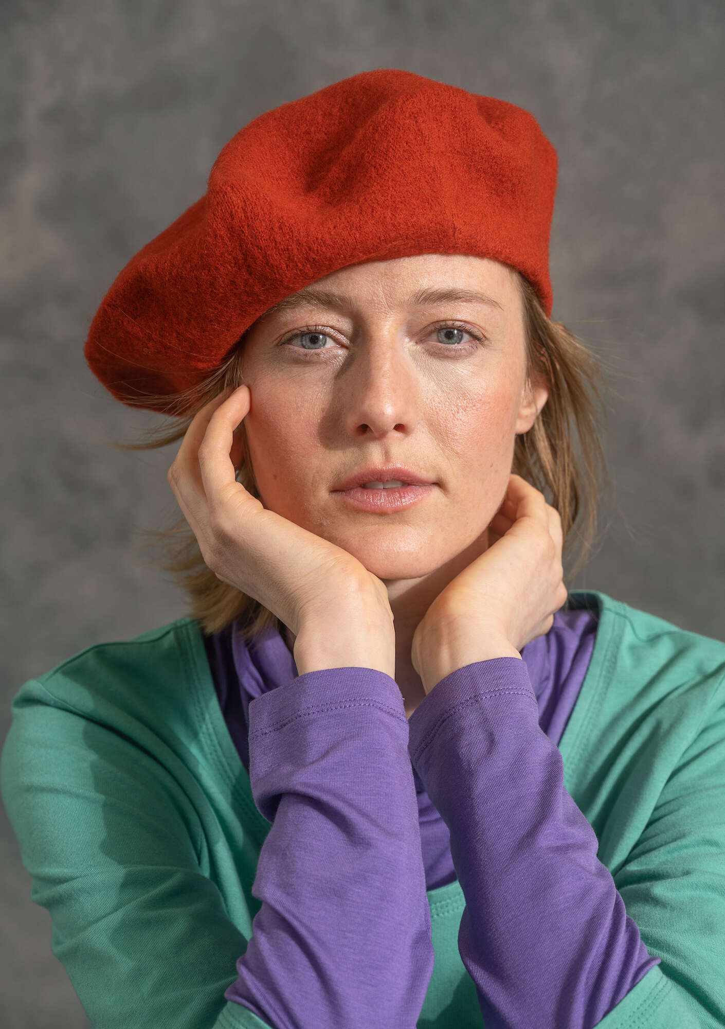 Knitted beret in felted organic wool