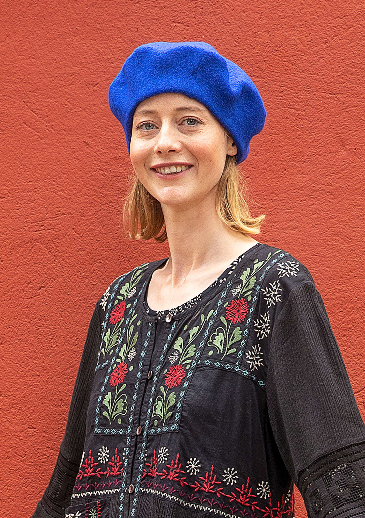 Knitted beret in felted organic wool