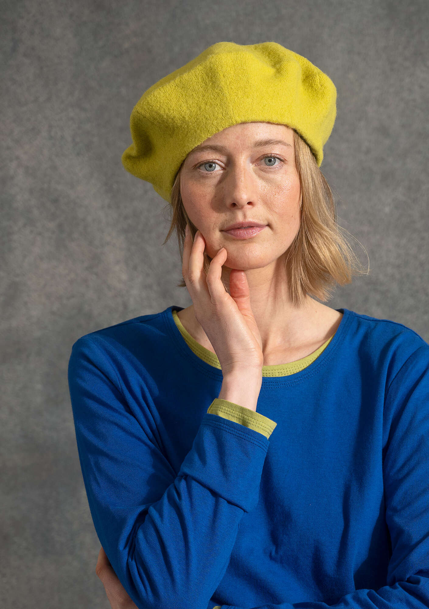 Knitted beret in felted organic wool
