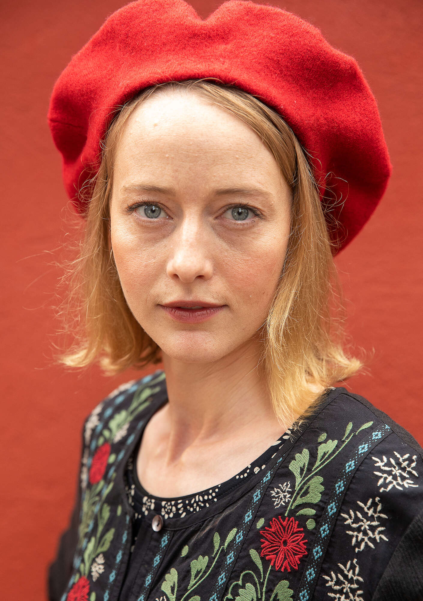 Knitted beret in felted organic wool