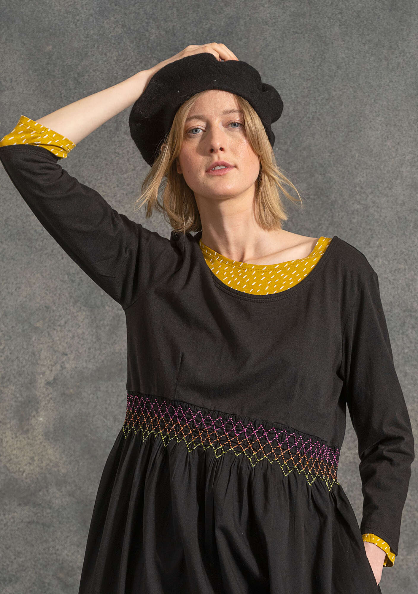 Knitted beret in felted organic wool