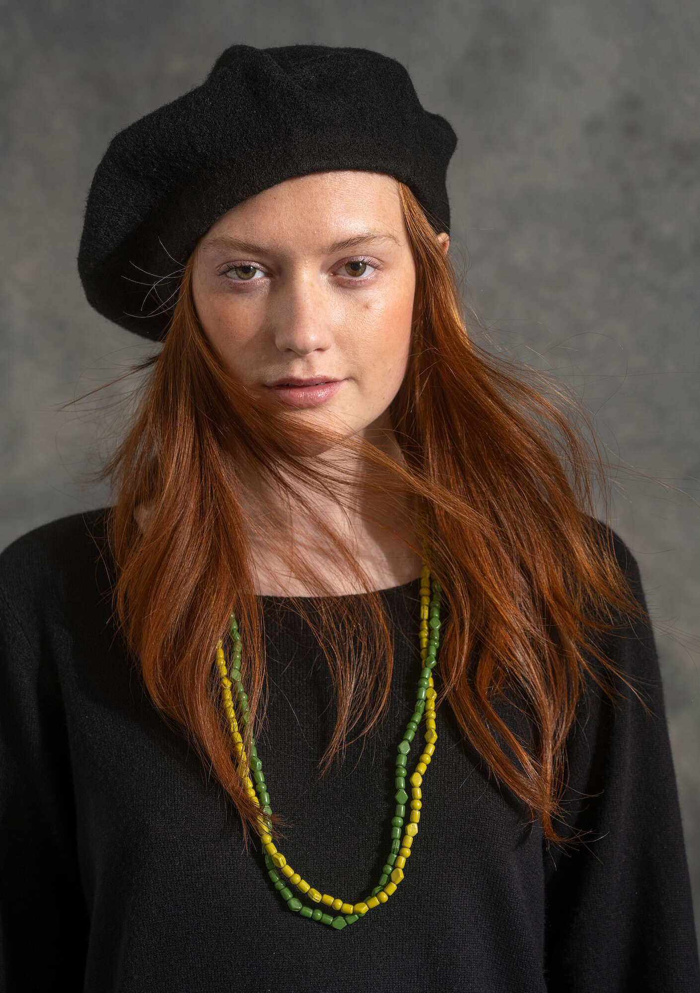 Knitted beret in felted organic wool