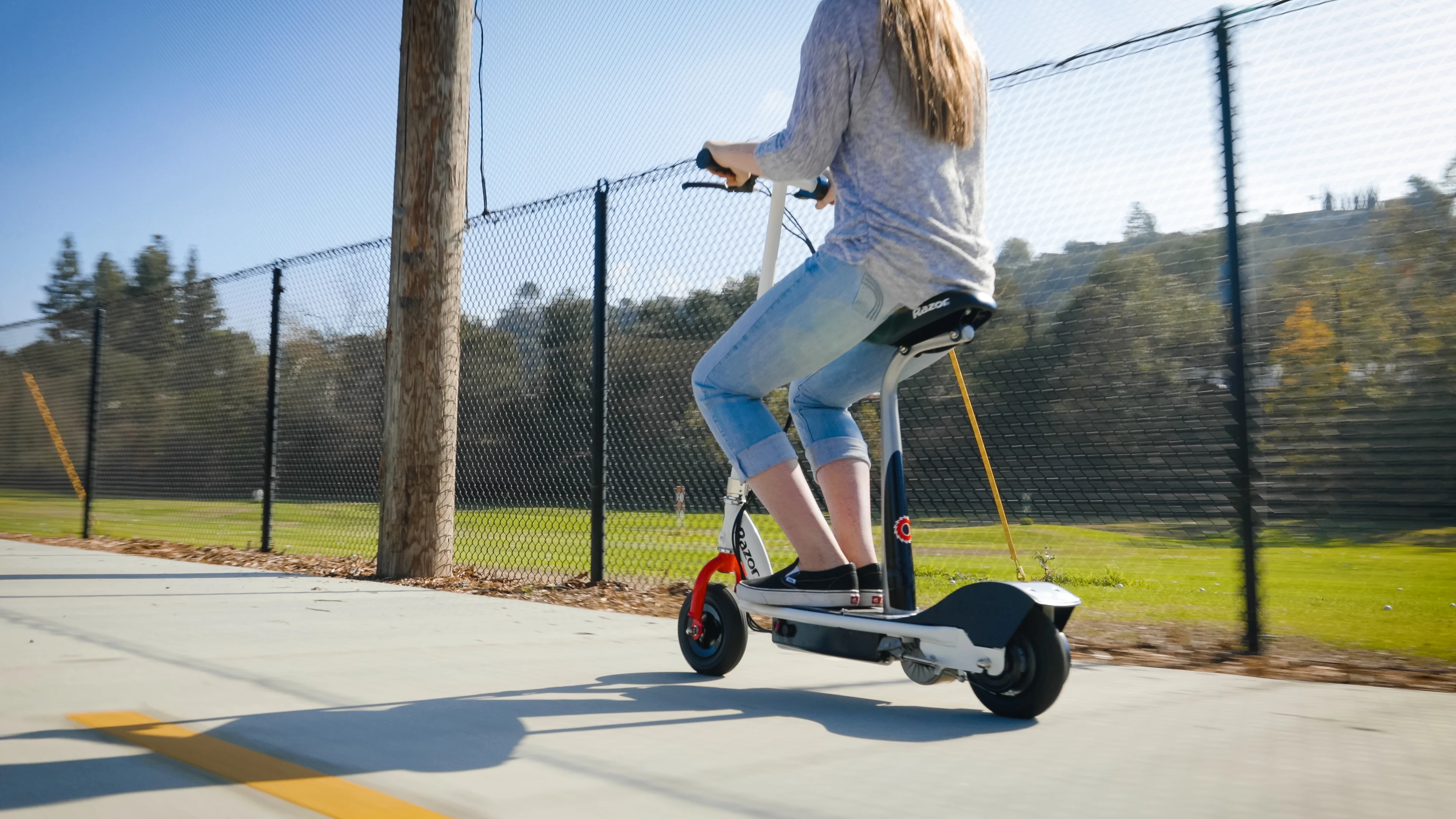 Razor E200S Seated Electric Scooter, for Ages 13+ and up to 154 lbs, 8″ Pneumatic Front Tire, 200W Chain Motor, Up to 12 mph & up to 8-mile Range, 24V Sealed Lead-Acid Battery