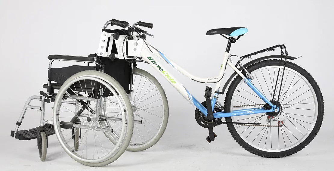 Wheelchair accessory for bicycle Adapta system