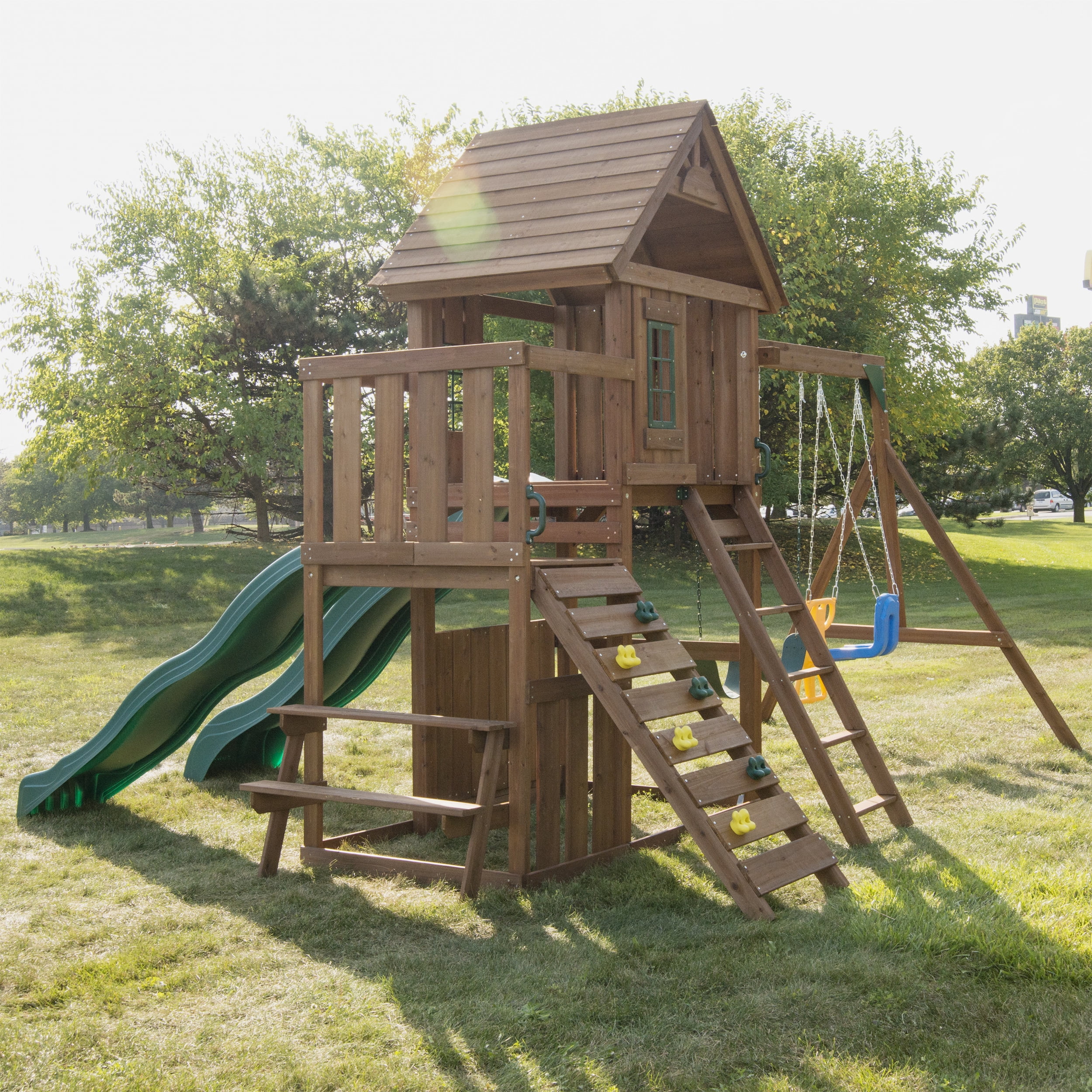 Swing-N-Slide Knightsbridge Deluxe Wood Backyard Swing Set with Two Slides, Wood Roof, Climbing Rock Wall, and Swings