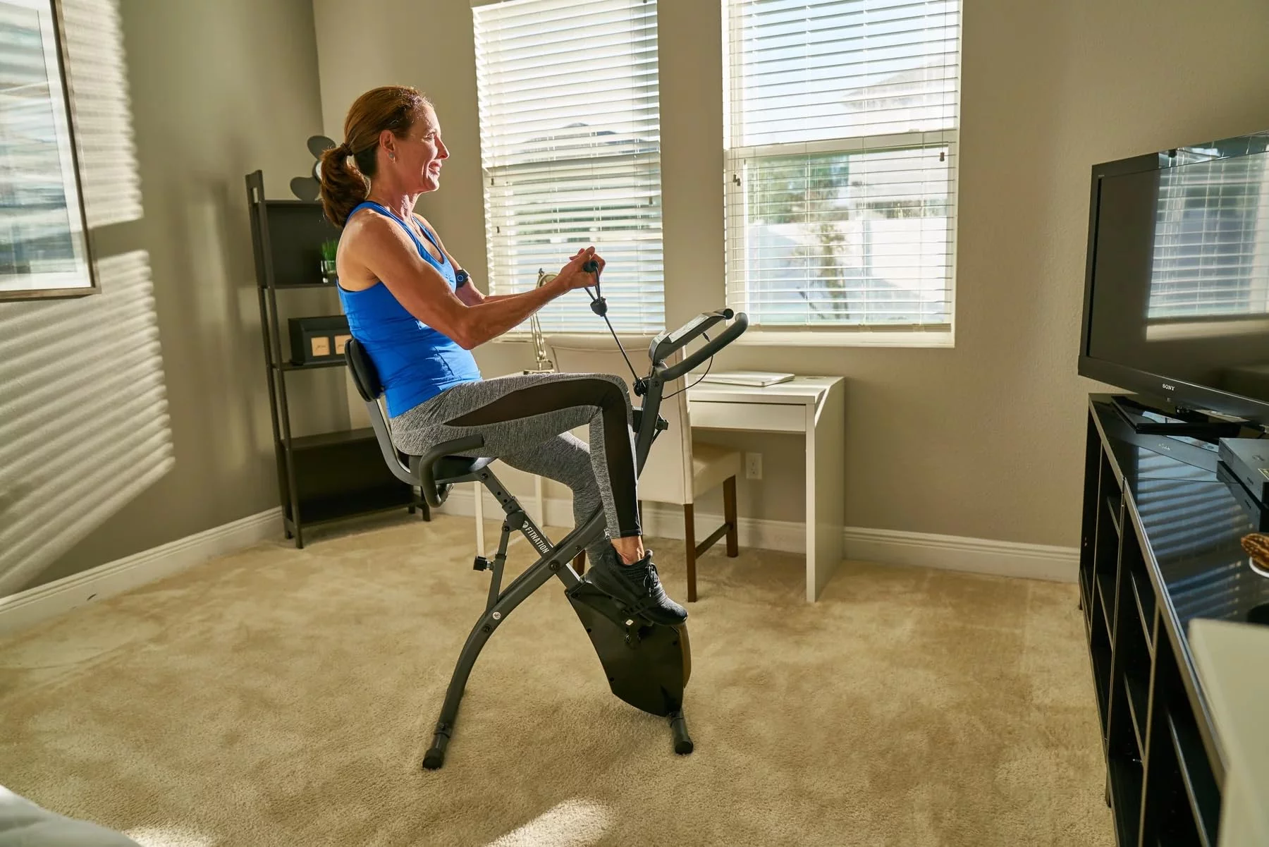 Echelon Flex Express Folding Exercise Bike: Magnetic, Foldable, Upright/Recumbent, Multi-Level Resistance, Arm Resistance Band, and LCD Display.