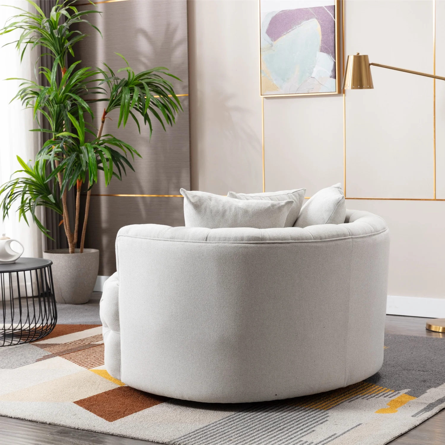 Modern and chic  the Coolmore Akili Beige Swivel Accent Barrel Chair is the perfect stylish and comfortable leisure chair for your hotel living room. Designed to create a modern and cool