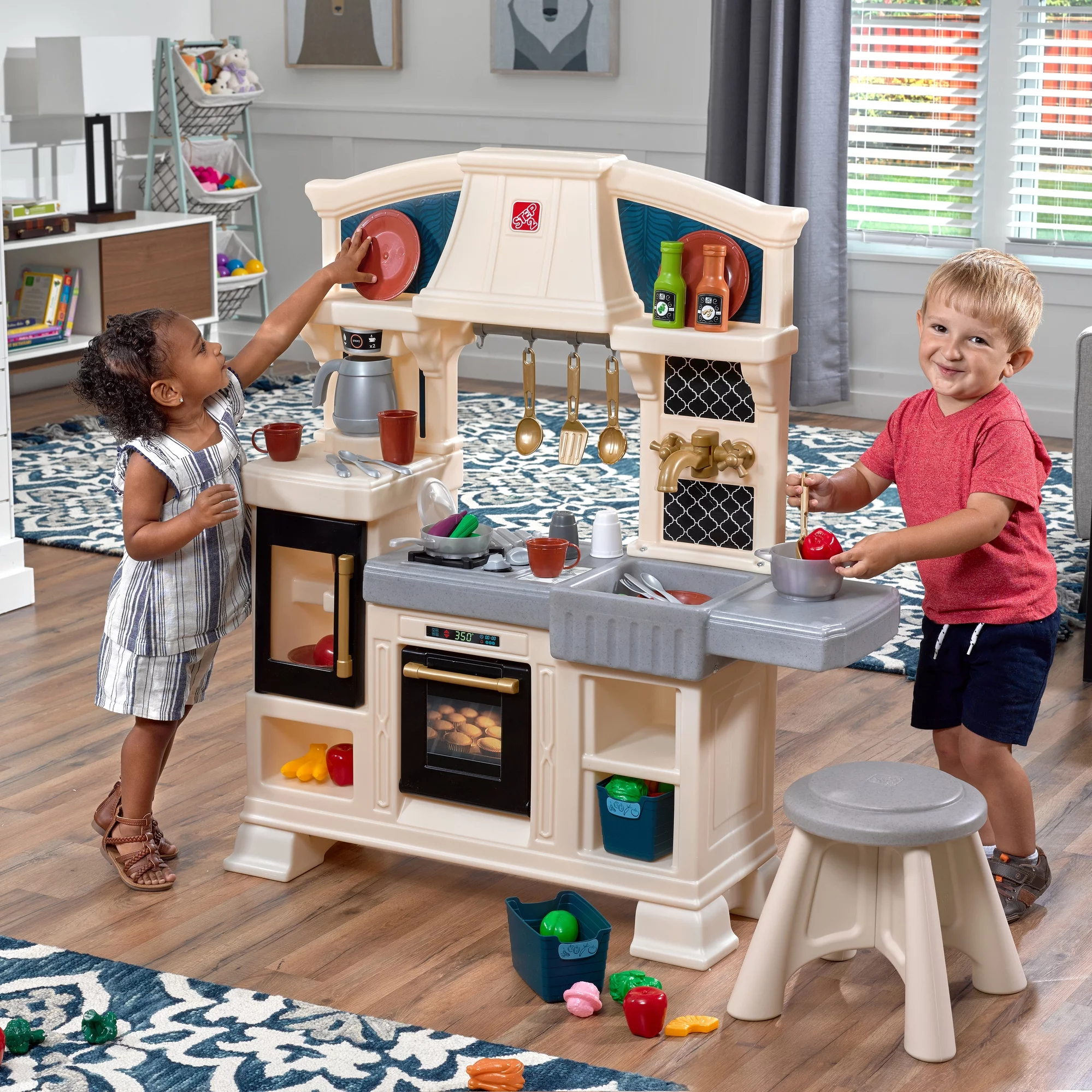 Step2 Classic Chic Kitchen includes 22 Piece Plastic Toddler Kitchen Playset