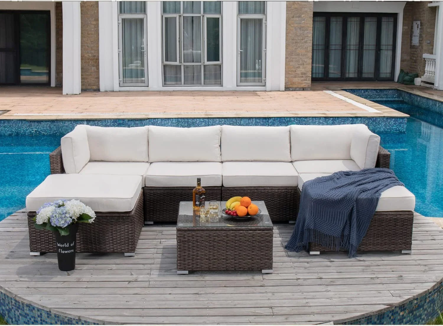 7-Piece Outdoor Patio  Chocolate Brown Wicker Executive Sectional Sofa w Dark Grey Thick Cushions  Glass-Top Coffee Table  2 Turquoise Pillows Incl. Rain Cover  Clips