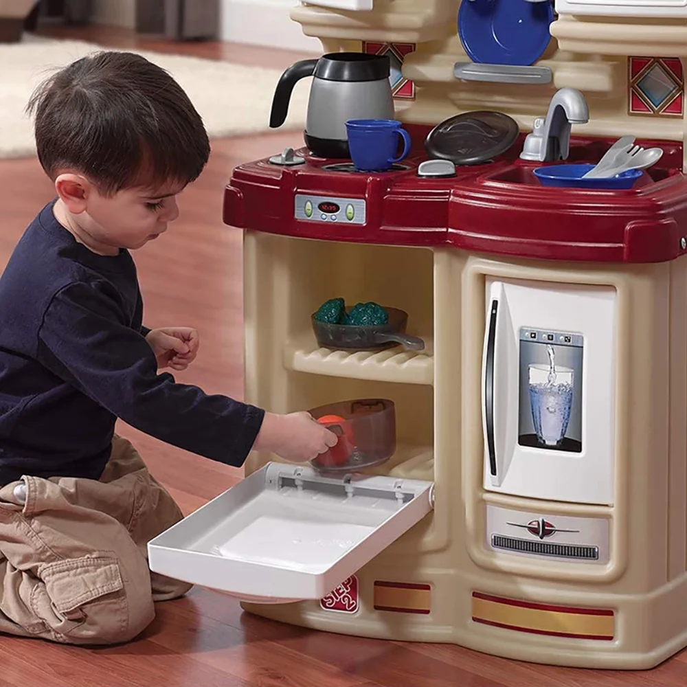 Step2 Tan Cozy Kitchen includes 21 Piece Plastic Toddler Kitchen Play Set