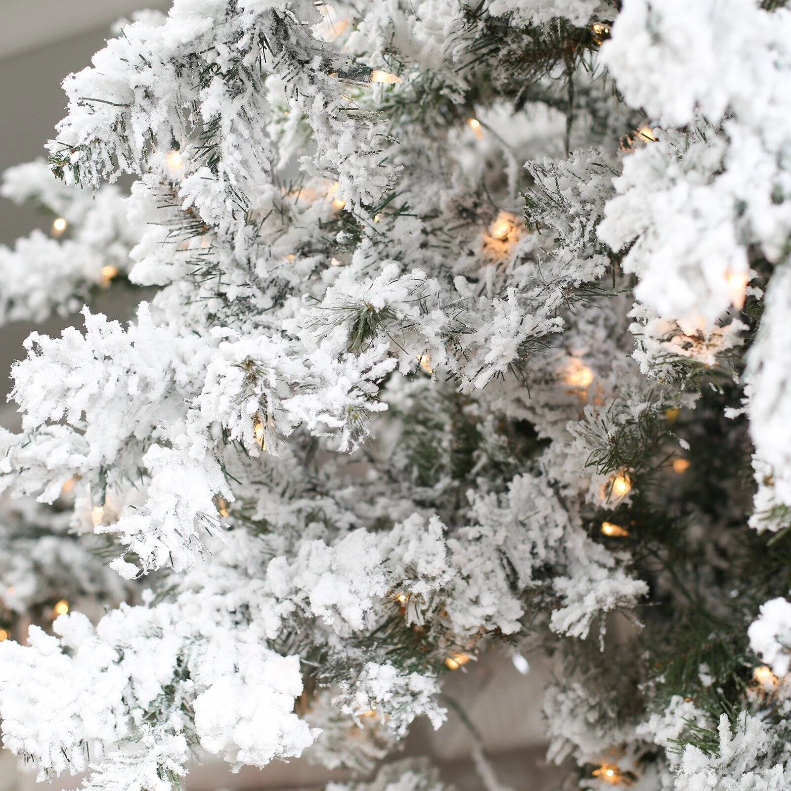 7.5 ft. Pre Lit Clear Lights Heavy Flocked Layered Spruce