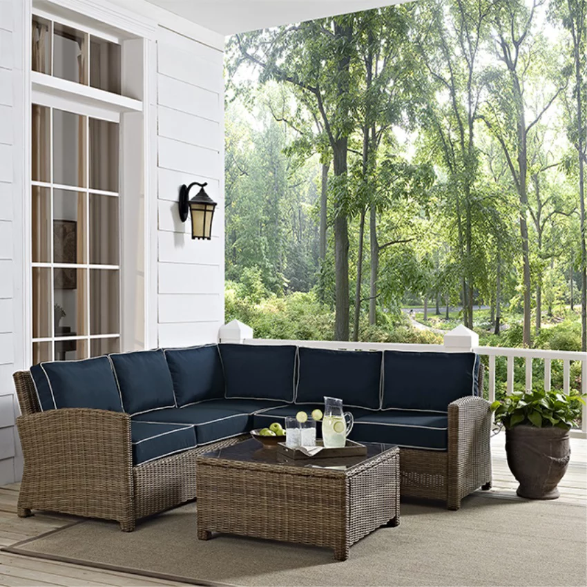 BRADENTON 4-PIECE OUTDOOR WICKER SEATING SET WITH NAVY CUSHIONS - RIGHT CORNER LOVESEAT, LEFT CORNER LOVESEAT, CORNER CHAIR, SECTIONAL GLASS TOP COFFEE TABLE
