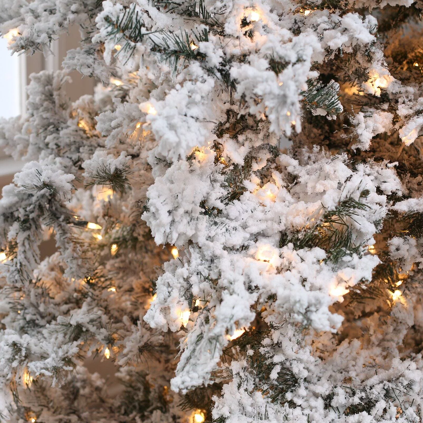 7.5 ft. Pre Lit Clear Lights Heavy Flocked Layered Spruce