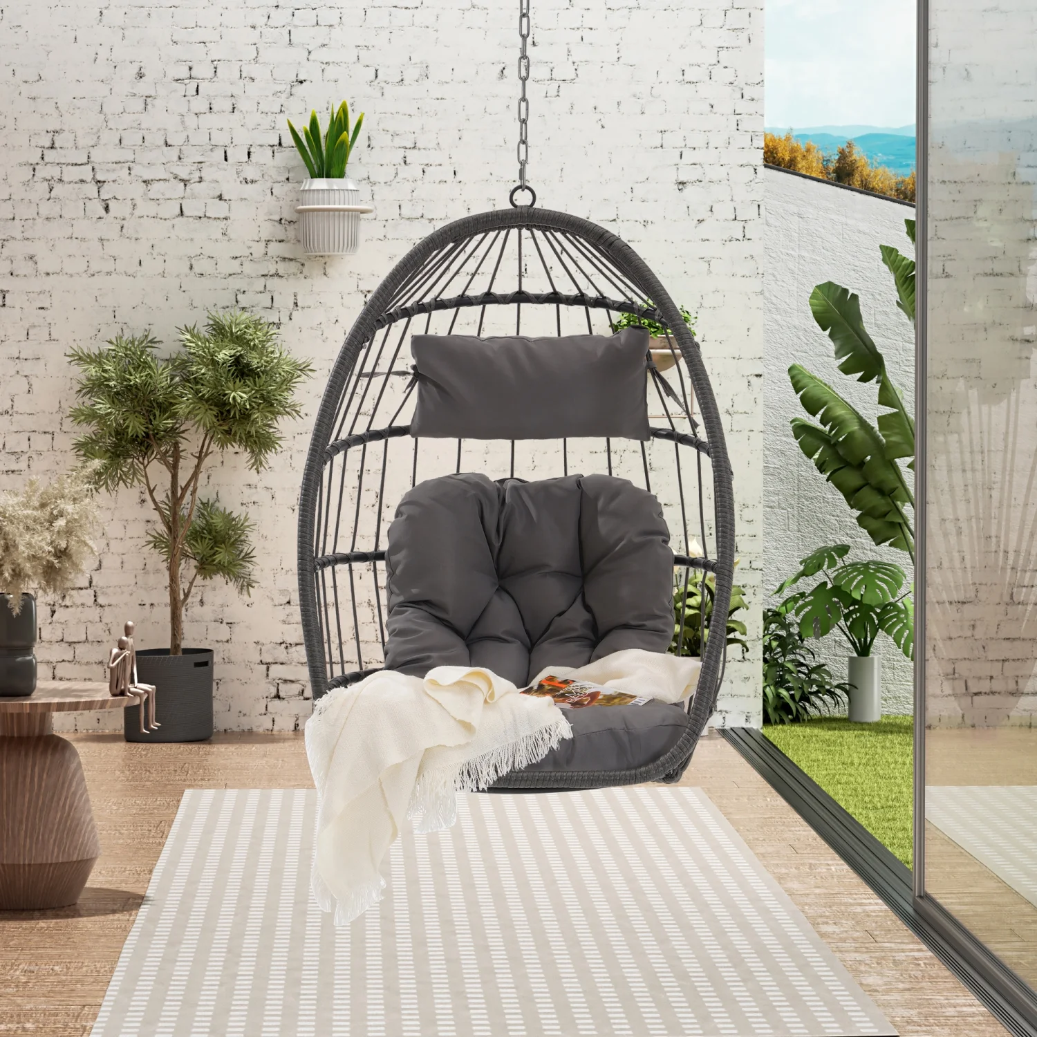 arden. Add a touch of Luxury to your outdoor decor with this Comfortable and Stylish Rattan Hanging Egg Swing Chair. Experience the Ultimate Relaxation and Comfort in your Outdoor Space w
